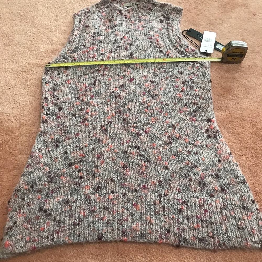 Liverpool sleeves less sweater with slit on the side